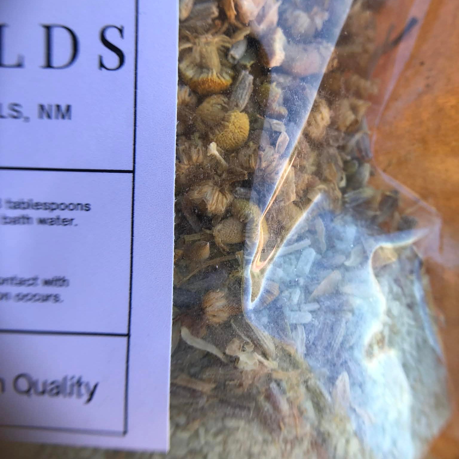 Bag of dried herbs with a label on the left side